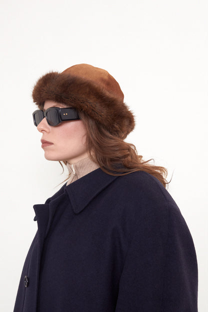 Suede winter hat with fur