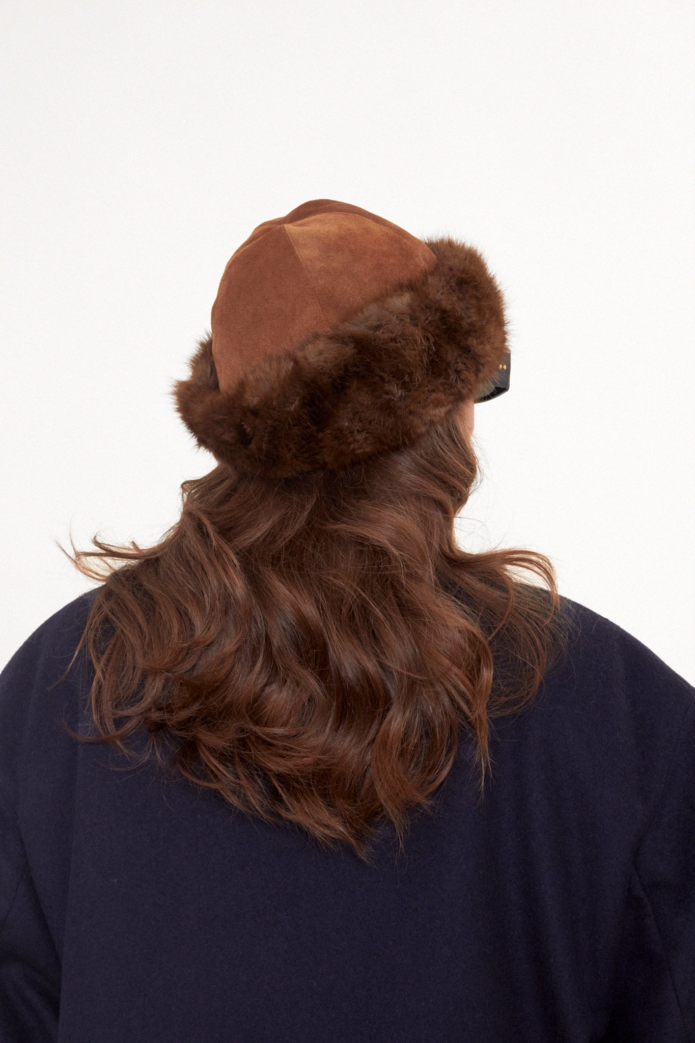 Suede winter hat with fur