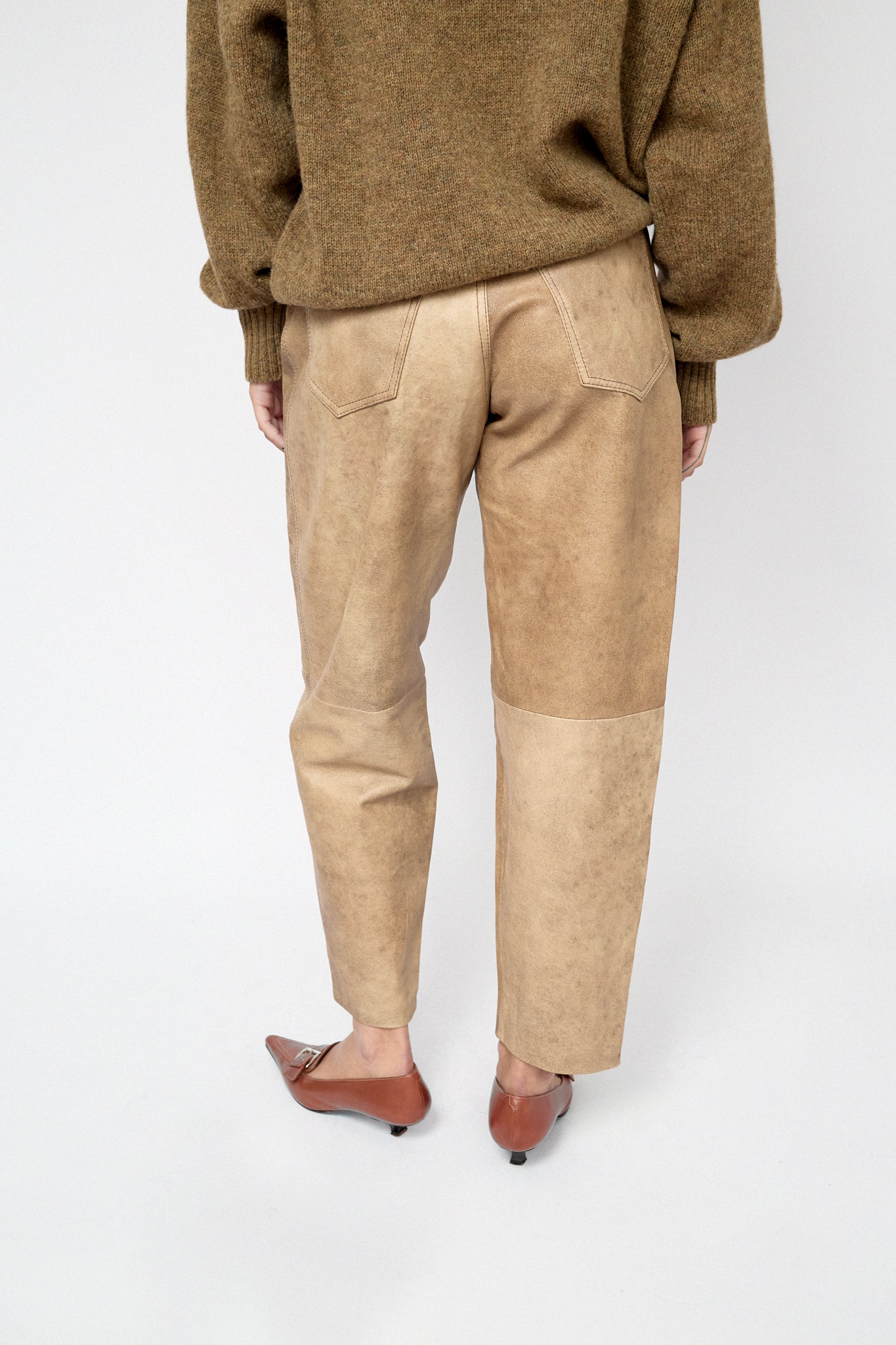 Beige leather trousers