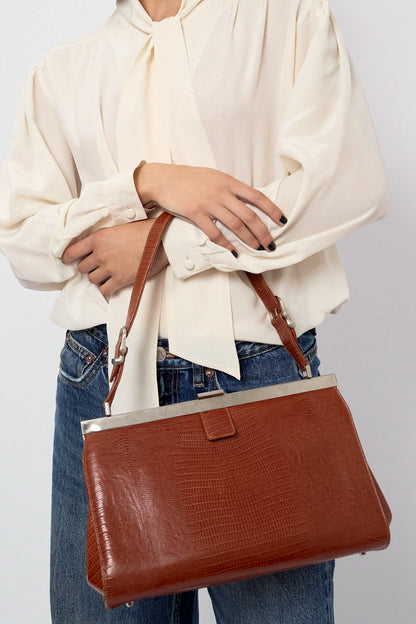 Brown leather handbag