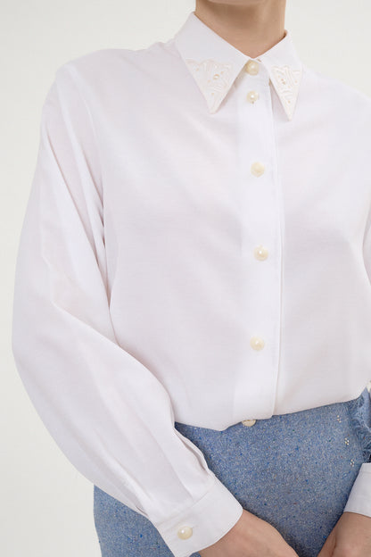 Oversized blouse with embellished collar